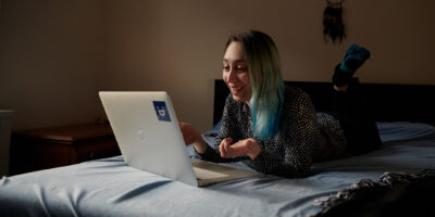 student at a laptop computer