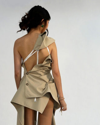 model in strappy khaki dress