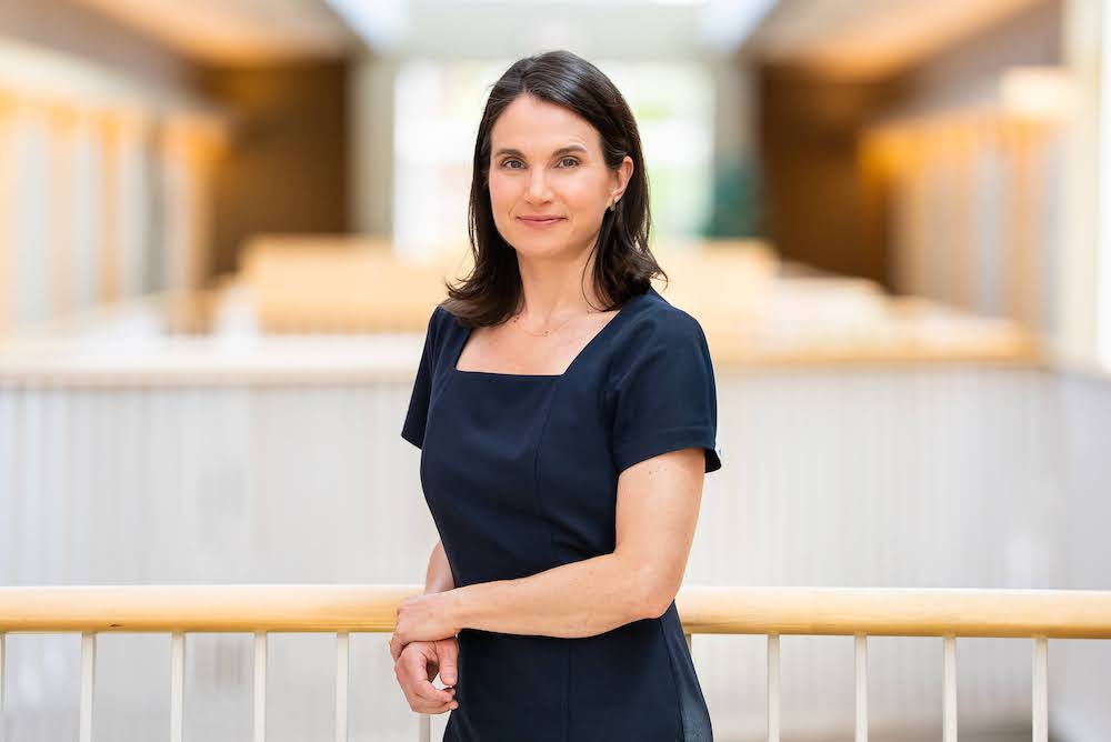 Stephanie Savell Headshot on third floor of the Watson School.
