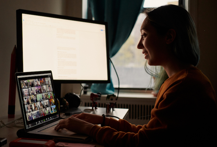 woman sitting at her computer